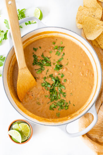 These Vegan Refried Beans are simple, easy and ready in 30 minutes. Making refried beans at home has never been easier | ThisSavoryVegan.com #thissavoryvegan #veganbeans #vegansidedish