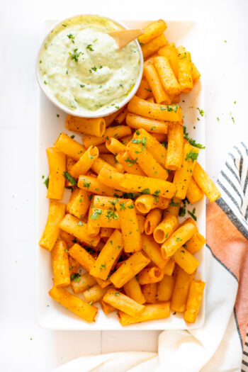 The viral recipe, but spiced up! These Air Fryer Buffalo Pasta Chips are super easy to make and are served with a side of vegan ranch | ThisSavoryVegan.com #thissavoryvegan #pastachips #tiktokrecipes
