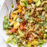 This Vegan Bacon Ranch Pasta Salad is loaded with tofu bacon, romaine, cherry tomatoes, homemade croutons, avocado, red onion and creamy vegan ranch | ThisSavoryVegan.com #thissavoryvegan #veganpastasalad #tofubacon