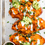These Buffalo Chickpea Stuffed Sweet Potatoes are smoky, slightly spicy and a healthy vegan dinner that everyone will love | ThisSavoryVegan.com #thissavoryvegan #vegandinner #glutenfree