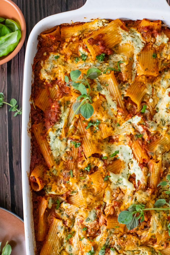Comfort food in a casserole dish - this Vegan Baked Rigatoni Bolognese is the perfect family dinner! A simple and flavorful vegan dinner idea | ThisSavoryVegan.com #thissavoryvegan #veganpasta #pastabake