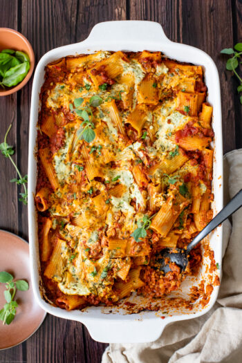Comfort food in a casserole dish - this Vegan Baked Rigatoni Bolognese is the perfect family dinner! A simple and flavorful vegan dinner idea | ThisSavoryVegan.com #thissavoryvegan #veganpasta #pastabake