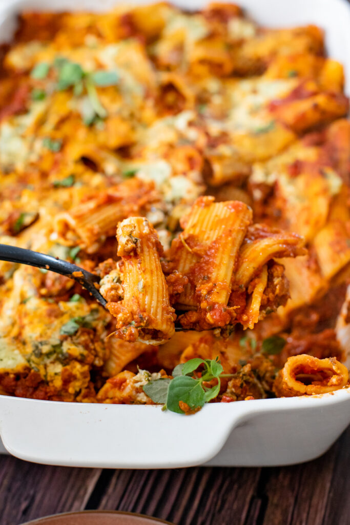 Comfort food in a casserole dish - this Vegan Baked Rigatoni Bolognese is the perfect family dinner! A simple and flavorful vegan dinner idea | ThisSavoryVegan.com #thissavoryvegan #veganpasta #pastabake