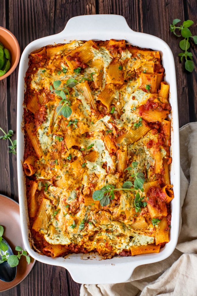 Comfort food in a casserole dish - this Vegan Baked Rigatoni Bolognese is the perfect family dinner! A simple and flavorful vegan dinner idea | ThisSavoryVegan.com #thissavoryvegan #veganpasta #pastabake