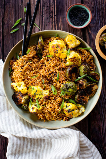 Hold the broth on this one - instead we are whipping up these saucy and delicious Roasted Veggie Ramen Noodles. A quick & healthy weeknight dinner | ThisSavoryVegan.com #vegannoodles #thissavoryvegan #veganramen