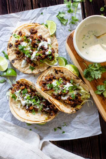 These Simple Black Bean Tacos with Vegan Lime Crema are the best weeknight dinner! Ready in less than 30 minutes and packed with flavor | ThisSavoryVegan.com #thissavoryvegan #vegantacos #beantacos