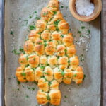 This Vegan Pull-Apart Christmas Tree is such a fun holiday appetizer! Crescent rolls are filled with vegan cream cheese & baked until golden | ThisSavoryVegan.com #thissavoryvegan #veganholidayappetizers #christmasappetizers