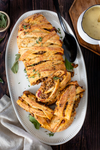 This Vegan Thanksgiving Lentil Stromboli is the perfect main entree for your vegan holiday feast! Incredibly easy and full of so much flavor | ThisSavoryVegan.com #thissavoryvegan #veganthanksgiving #veganthanksgivingentree