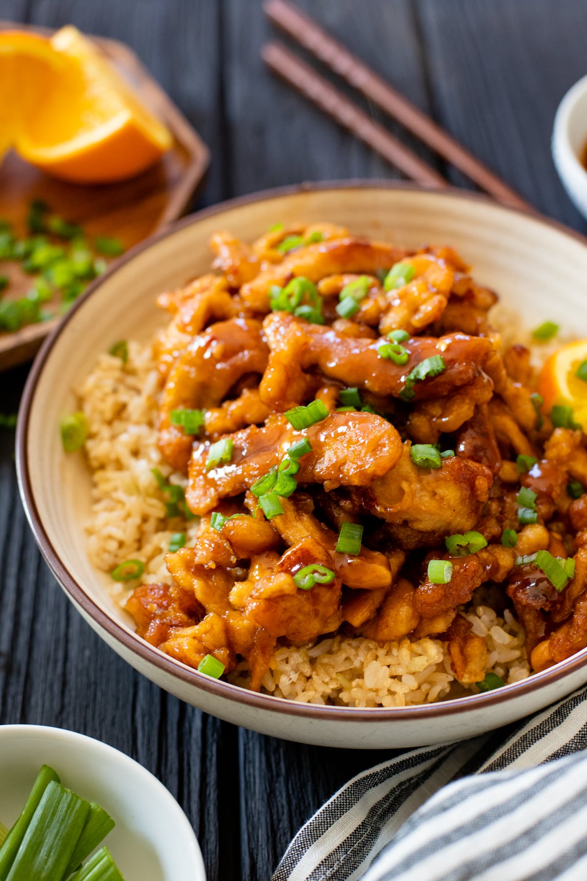 This Vegan Orange Chicken is AMAZING! Made with soy curls and a homemade sauce, this is perfectly crispy and better than takeout | ThisSavoryVegan.com #thissavoryvegan #veganchicken #vegantakeoutrecipes