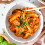 This Creamy Vegan Tomato Penne requires just a handful of ingredients and one pot! Perfect for a date night served with a big green salad | ThisSavoryVegan.com #thissavoryvegan #veganpasta #creamypasta