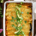 These Vegan Lentil & Bean Enchiladas are packed with flavor, baked until bubbly and topped with a delicious Avocado Jalapeño Sauce | ThisSavoryVegan.com #thissavoryvegan #veganenchiladas #vegandinnerideas