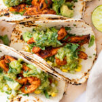 These Chipotle Soy Curl Tacos with Tomatillo Salsa are the BEST vegan tacos! Homemade tomatillo salsa, avocado corn salsa & crispy soy curls | ThisSavoryVegan.com #thissavoryvegan #vegantacos #soycurlrecipes