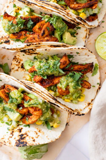 These Chipotle Soy Curl Tacos with Tomatillo Salsa are the BEST vegan tacos! Homemade tomatillo salsa, avocado corn salsa & crispy soy curls | ThisSavoryVegan.com #thissavoryvegan #vegantacos #soycurlrecipes