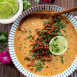 This Poblano Soup with Crispy Soyrizo is filled with beans, spices and veggies. All topped off with crumbled soyrizo, cilantro and a lime wedge | ThisSavoryVegan.com #thissavoryvegan #vegansoup #vegandinnerideas