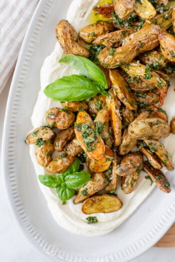 This Whipped Vegan Feta with Herb Potatoes is the perfect side dish. Made with Trader Joe's vegan feta and crispy fingerling potatoes | ThisSavoryVegan.com #thissavoryvegan #veganspringrecipes #vegantraderjoes
