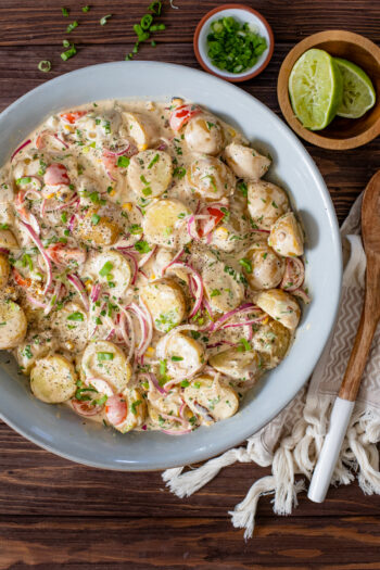 This Vegan Southwest Potato Salad is the perfect BBQ side! Chunky potatoes, creamy chipotle dressing and a mix of fresh veggies | ThisSavoryVegan.com #thissavoryvegan #veganpotatosalad #veganbbqsides