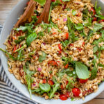 This Mediterranean Orzo Pasta Salad is the perfect party salad! Light, refreshing, veggie-packed and serves 10 | ThisSavoryVegan.com #thissavoryvegan #orzosalad #pastasalad