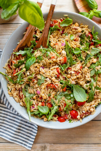 This Mediterranean Orzo Pasta Salad is the perfect party salad! Light, refreshing, veggie-packed and serves 10 | ThisSavoryVegan.com #thissavoryvegan #orzosalad #pastasalad