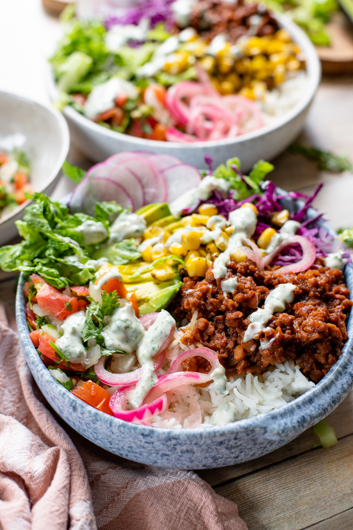 These Vegan BBQ Beef Bowls are the perfect weeknight dinner. Vegan beef crumbles, rice and all the veggies topped with a dairy-free yogurt ranch | ThisSavoryVegan.com #thissavoryvegan #veganbowls #veganbeef