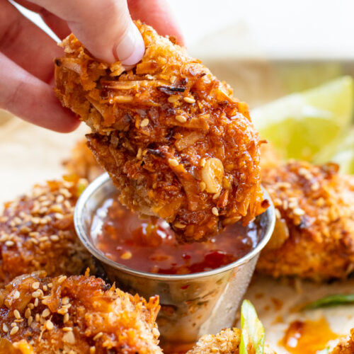 These Vegan Asian Chicken Wings are made out of soy curls, coated in panko and air fried until crispy. Served up with a sweet and spicy sauce | ThisSavoryVegan.com #thissavoryvegan #veganwings #soycurlrecipes