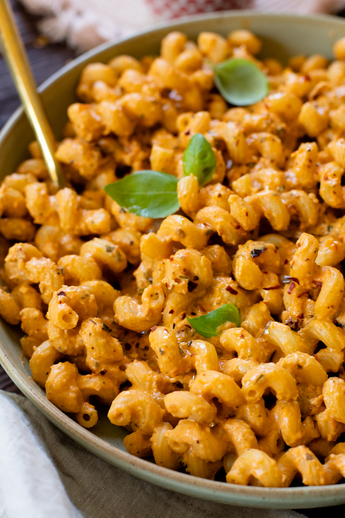 This Vegan Roasted Tomato Ricotta Pasta is comfort in a bowl. The sauce is a mix of roasted tomatoes & garlic, vegan ricotta and fresh herbs | ThisSavoryVegan.com #thissavoryvegan #veganpasta #vegandinnerideas
