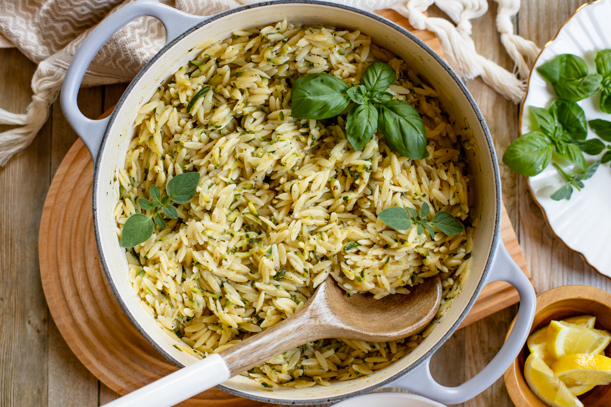 Not sure how to use up the rest of that summer zucchini? This Creamy Lemon Zucchini Orzo is just the thing. The perfect vegan side dish | ThisSavoryVegan.com #thissavoryvegan #summerrecipes #zucchinirecipes