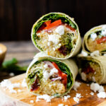A quick, simple and delicious vegan lunch - these Mediterranean Quinoa Wraps have chilled quinoa, lots of veggies and vegan feta | ThisSavoryVegan.com #thissavoryvegan #veganwraps #backtoschoollunch