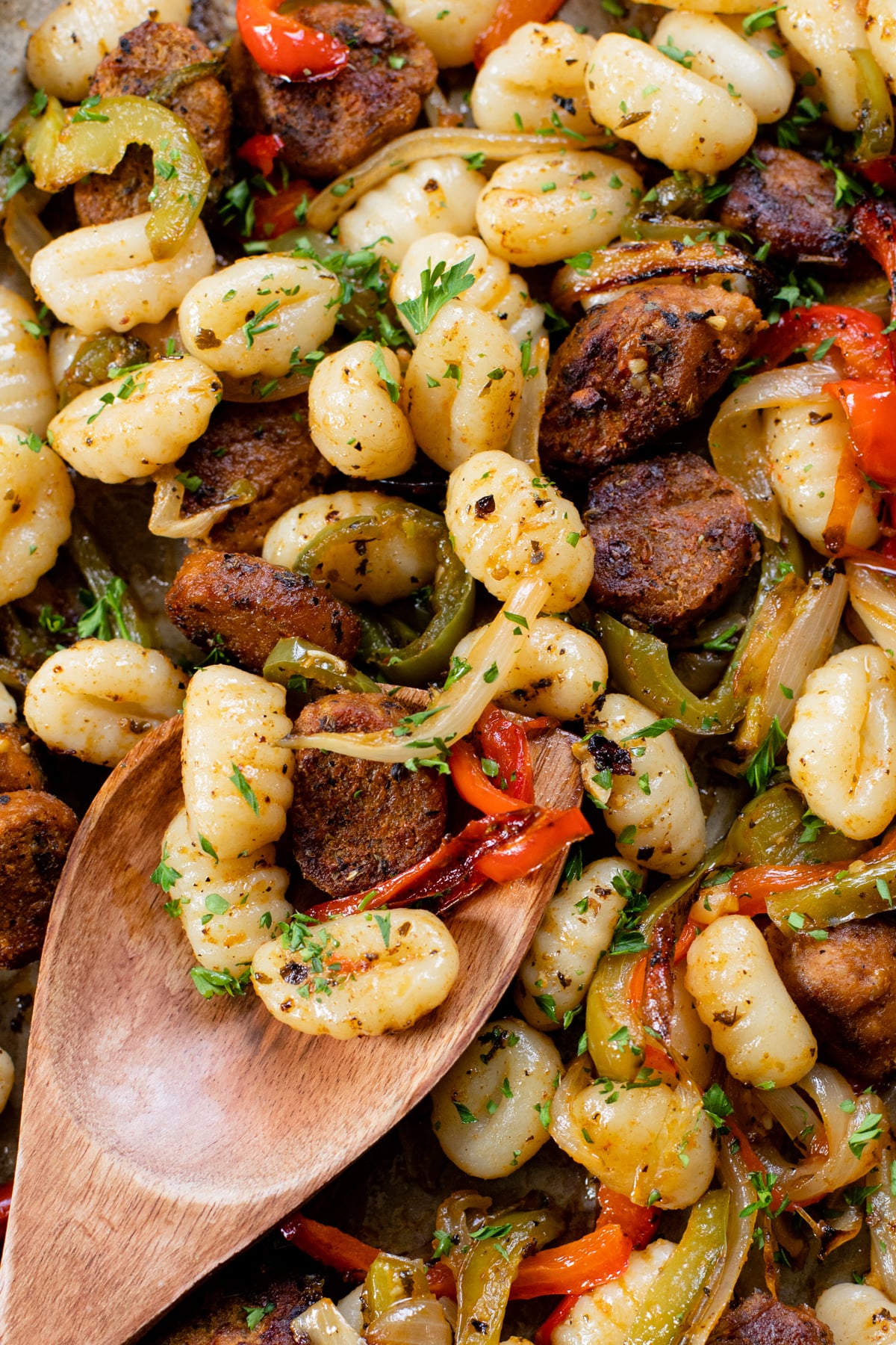 Vegan Sausage, Peppers & Gnocchi is the perfect weeknight sheet pan dinner! Ready in 30 minutes and made on just one baking sheet. Quick, easy, delicious | ThisSavoryVegan.com #thissavoryvegan #sheetpandinner #vegandinnerideas