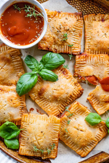 These Vegan Puff Pastry Pizza Pockets are fluffy, crispy little homemade pizza pockets filled with vegan cream cheese, pepperoni and marinara | ThisSavoryVegan.com #thissavoryvegan #puffpastryrecipes #pizzapockets