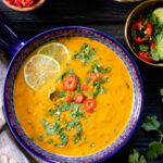 This Red Curry Lentil Soup has a cabbage base that is blended until smooth and then combined with coconut milk & cooked lentils | ThisSavoryVegan.com #thissavoryvegan #lentilsoup #fallrecipes