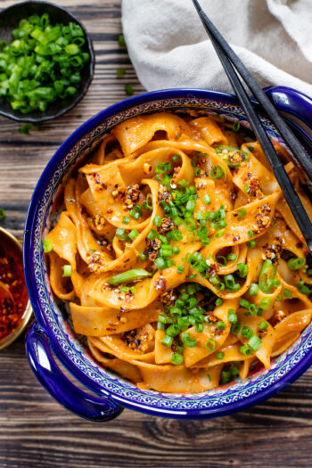 These Spicy Vegan Gochujang Noodles are ready in 30 minutes and pack the perfect amount of heat & creaminess. These are comfort in a bowl | ThisSavoryVegan.com #thissavoryvegan #spicynoodles #vegannoodles