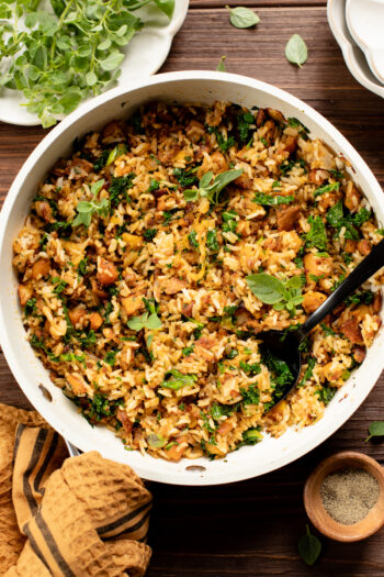 The perfect fall dinner - this Vegan Sausage & Butternut Squash Rice Skillet has roasted squash, crispy vegan sausage, fresh herbs & kale | ThisSavoryVegan.com #thissavoryvegan #skilletdinner #fallrecipes
