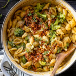 This Creamy Vegan Broccoli & Shells dish is made in one-pot and topped with crispy shallots for the perfect crunch. An easy vegan dinner | ThisSavoryVegan.com #thissavoryvegan #onepotrecipe #veganpasta