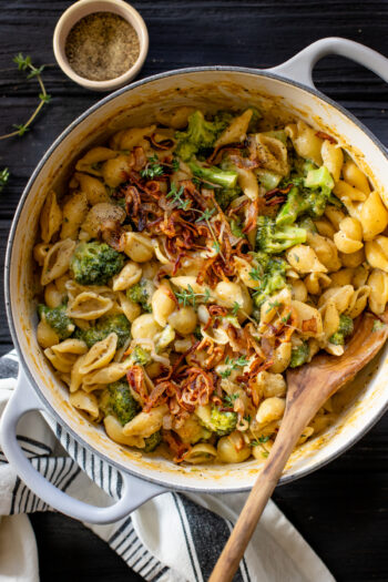 This Creamy Vegan Broccoli & Shells dish is made in one-pot and topped with crispy shallots for the perfect crunch. An easy vegan dinner | ThisSavoryVegan.com #thissavoryvegan #onepotrecipe #veganpasta