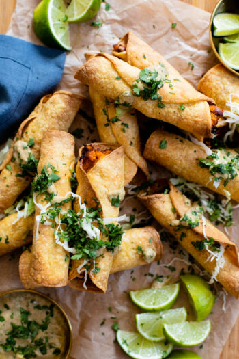 These Sweet Potato Rolled Tacos are filled with mashed sweet potatoes, pinto beans & seasonings. Wrapped in corn tortillas and cooked until crispy | ThisSavoryVegan.com #thissavoryvegan #rolledtacos #vegantaquitos