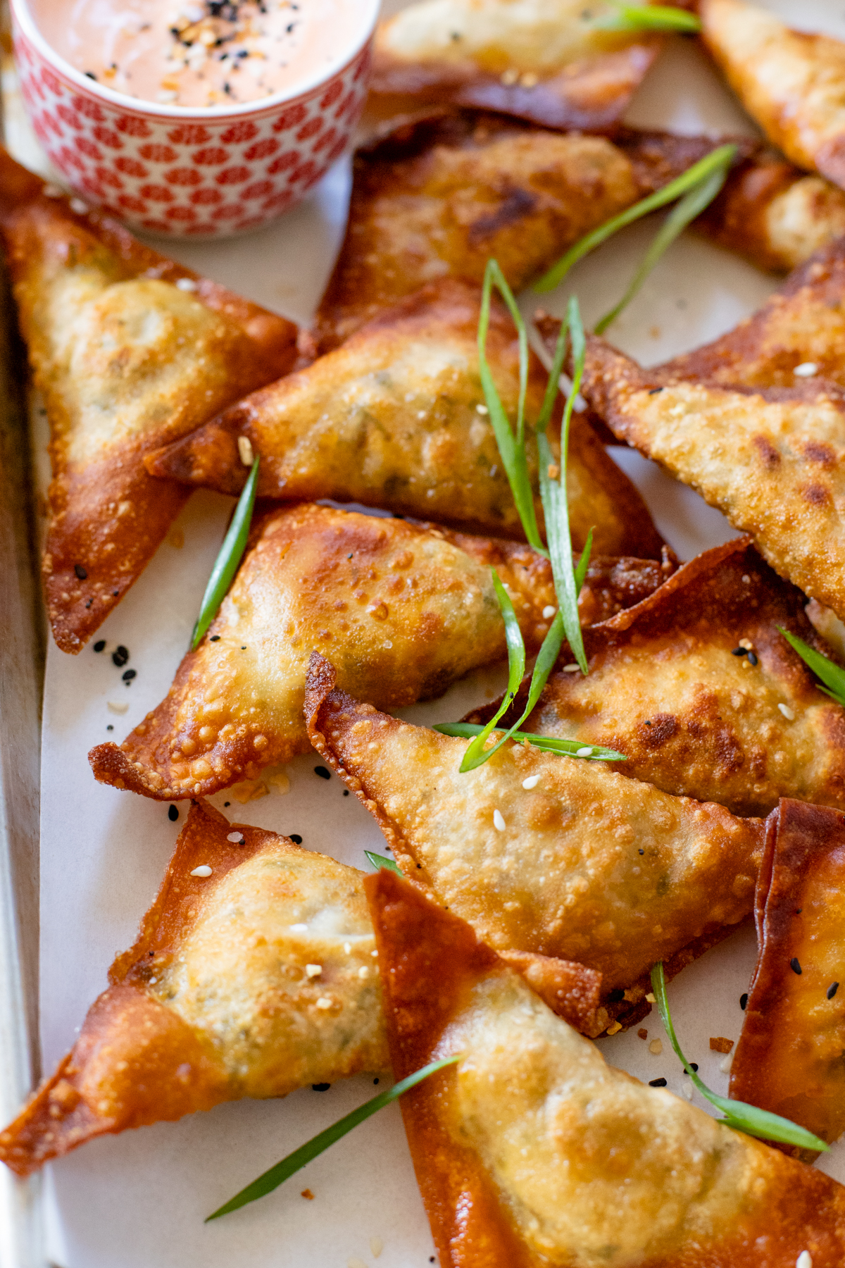 These Crispy Jalapeño Corn Wontons are the perfect vegan appetizer! Wonton wrappers are stuffed with vegan cream cheese & veggies | ThisSavoryVegan.com #thissavoryvegan #veganappetizers #wontons