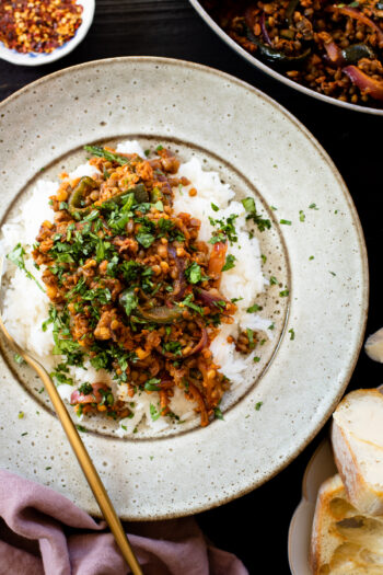 These Soyrizo Lentil Rice Bowls are the best vegan dinner! Plenty of veggies, zesty soyrizo & cooked lentils in broth - served over rice with crispy bread | ThisSavoryVegan.com #thissavoryvegan #lentilrecipes #weeknightdinnerideas