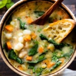 This White Bean Gnocchi Soup is comforting, simple & delicious. Filled with veggies, herbs and mini gnocchi. The best vegan soup | ThisSavoryVegan.com #thissavoryvegan #vegansoup #winterrecipes