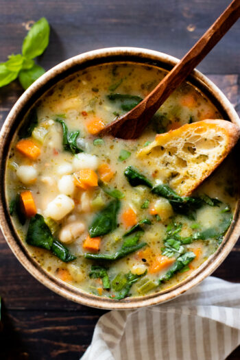 This White Bean Gnocchi Soup is comforting, simple & delicious. Filled with veggies, herbs and mini gnocchi. The best vegan soup | ThisSavoryVegan.com #thissavoryvegan #vegansoup #winterrecipes