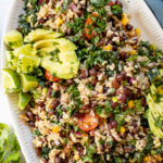 This Black Bean Brown Rice Salad is filled with veggies, tossed with a chipotle vinaigrette and topped with avocado & cilantro | ThisSavoryVegan.com #thissavoryvegan #saladideas #veganlunch