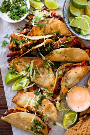 These Maple Sriracha Soy Curl Tacos are crispy, sweet & spicy. Air fried (or baked) and served with spicy mayo, shredded cabbage & limes | ThisSavoryVegan.com #thissavoryvegan #vegantacos #asiantacos