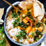 This Slow Cooker Sweet Potato Curry is creamy, comforting, veggie packed and delicious. A simple vegan dinner idea | ThisSavoryVegan.com #thissavoryvegan #slowcookerrecipes #vegancurry