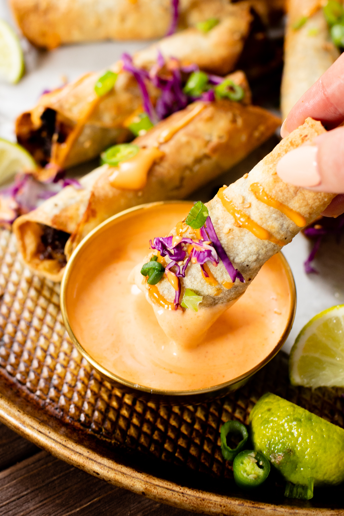 These Vegan Korean Beef Taquitos are addicting! Saucy vegan beef crumbles in corn tortillas & air-fried until crispy. Served with spicy mayo | ThisSavoryVegan.com #thissavoryvegan #taquitos #airfryerrecipes