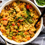 This Vegan Sausage & Peppers Rice Skillet is such a quick and delicious dinner idea! A one-pot dinner that is ready in 30 minutes | ThisSavoryVegan.com #thissavoryvegan #skilletdinners #onepotrecipes