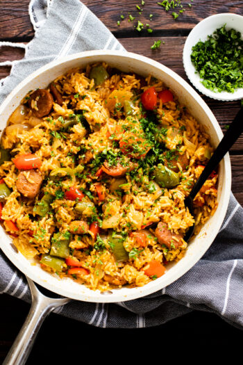 This Vegan Sausage & Peppers Rice Skillet is such a quick and delicious dinner idea! A one-pot dinner that is ready in 30 minutes | ThisSavoryVegan.com #thissavoryvegan #skilletdinners #onepotrecipes