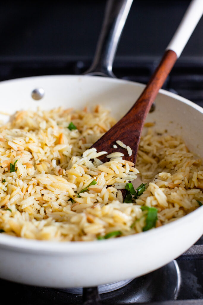 These Vegan Turkey Meatballs & Orzo are the best vegan dinner! Meatballs are simmered in marinara sauce before being served over garlic basil orzo | ThisSavoryVegan.com #thissavoryvegan #veganmeatballs #easyvegandinner
