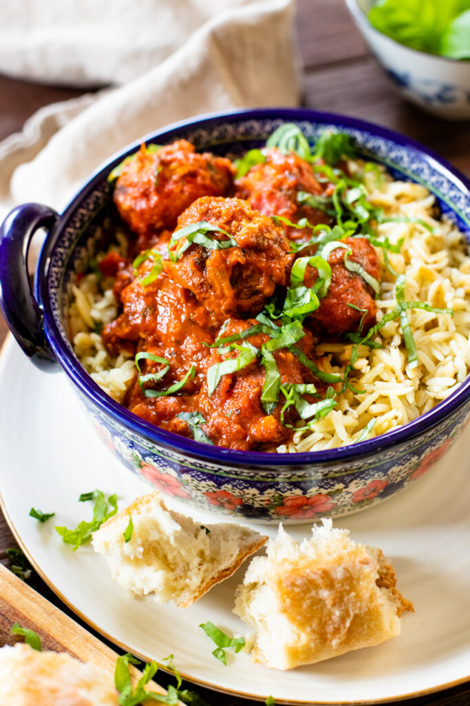 These Vegan Turkey Meatballs & Orzo are the best vegan dinner! Meatballs are simmered in marinara sauce before being served over garlic basil orzo | ThisSavoryVegan.com #thissavoryvegan #veganmeatballs #easyvegandinner