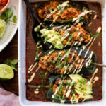 These Veggie Stuffed Poblano Peppers are filled with brown rice, black beans & veggies that are cooked down in enchilada sauce | ThisSavoryVegan.com #thissavoryvegan #stuffedpeppers #vegandinnerideas