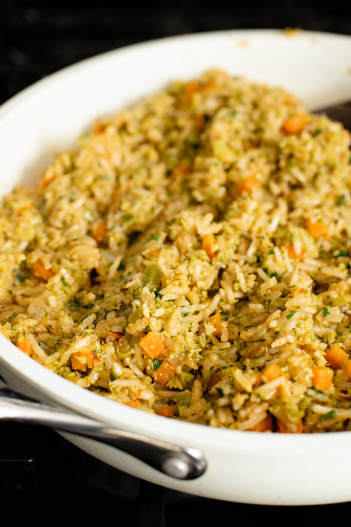 This Broccoli Coconut Rice Stir-Fry is an easy vegan dinner that is packed with sneaky veggies. Serve with your favorite tofu for an easy weeknight dinner | ThisSavoryVegan.com #thissavoryvegan #coconutrice #friedrice