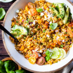 This Butternut Squash Couscous Salad is made with roasted squash, pearl couscous, vegan feta, chopped veggies & a creamy dressing | ThisSavoryVegan.com #thissavoryvegan #pastasalad #veganmealprep